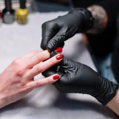 ANEMOI Powder-free Black Nitrile Hand Gloves 7 person-in-black-gloves-massaging-fingers-3997383-Copy.jpg